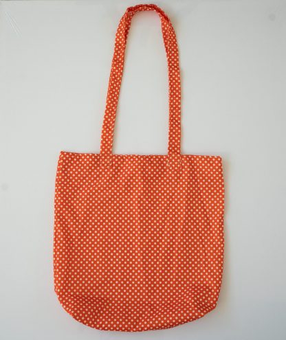 red polka dot tote bag